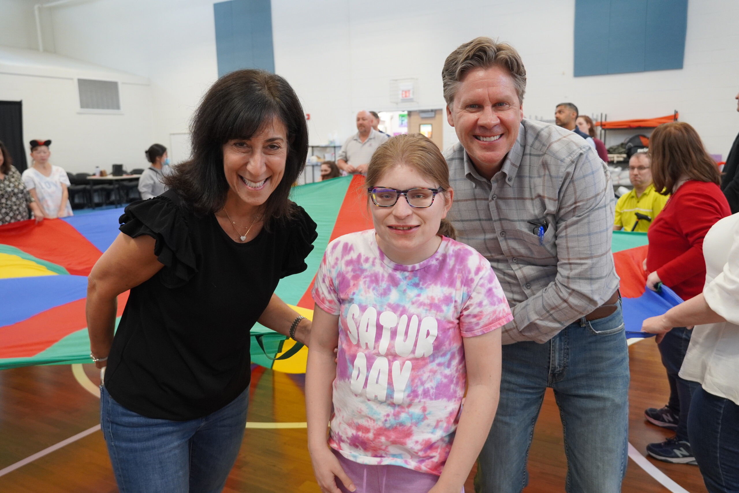 A group photo of two board members with a CEL member smiling during the Board Retreat.